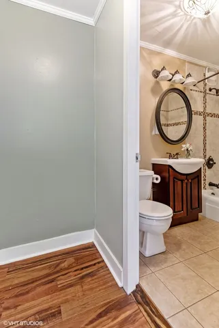 a bathroom with a toilet and a sink