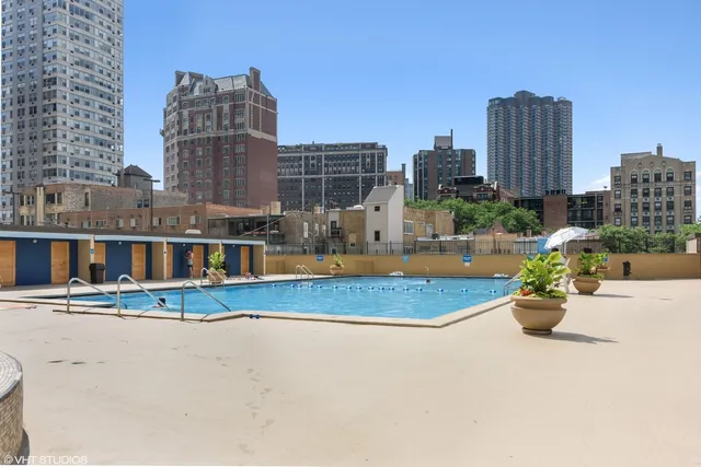 a patio with a table and chairs