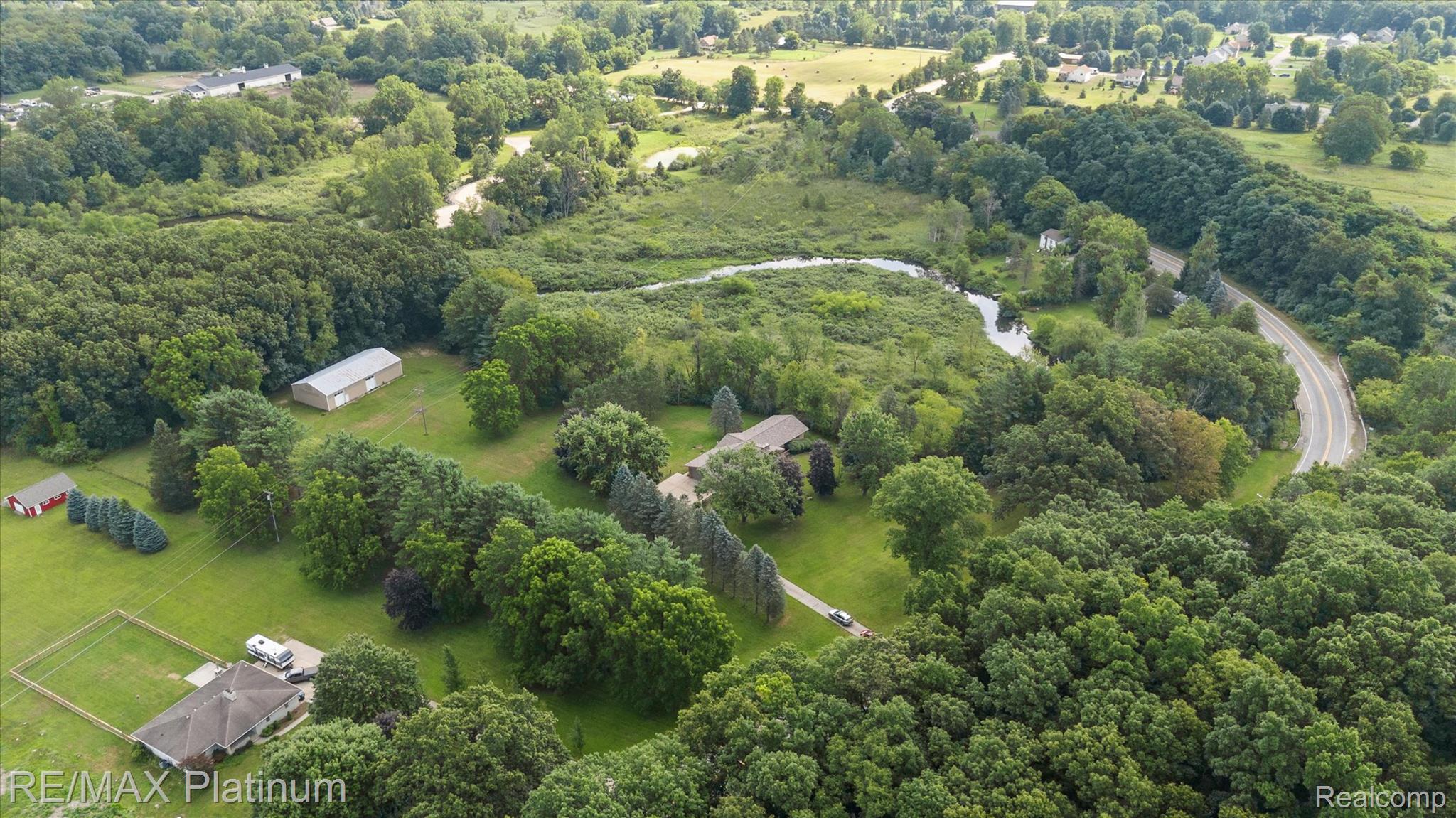 3200 Patterson Lk Road Pinckney, MI 48169 - Photo 34 of 46 55-3200-Patterson-Lake-Rd-Pinckney-MI-48169-WindowStill-11.jpg