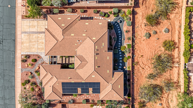 322 340 E Street Ivins, UT 84738 - Photo 57 of 61 Expansive property featuring a multi-gabled roofline and solar panel installation