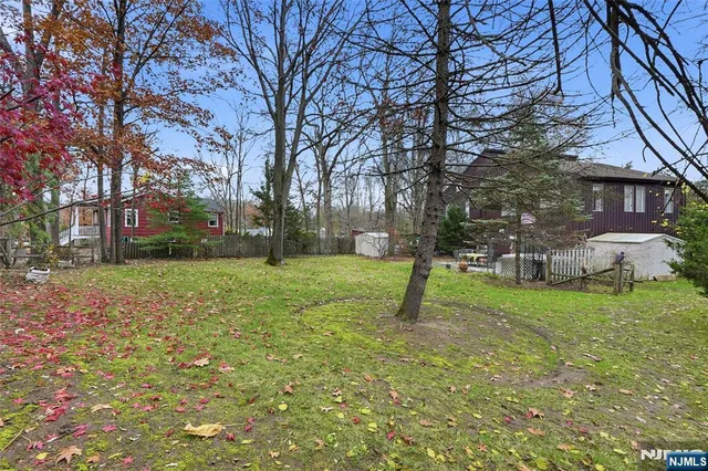 a view of a backyard with a garden