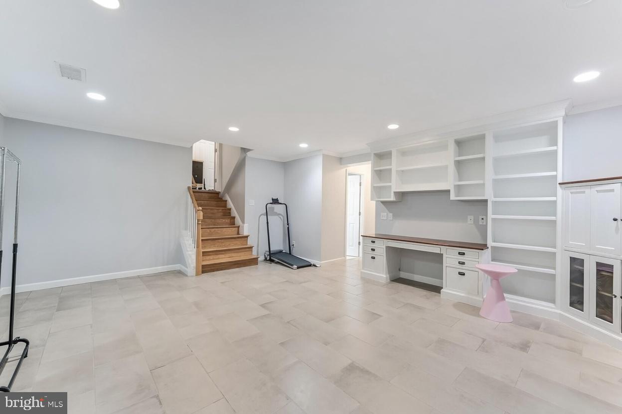 11621 Sourwood Lane Reston, VA 20191 - Photo 21 of 26 a view of a kitchen with a sink and cabinets