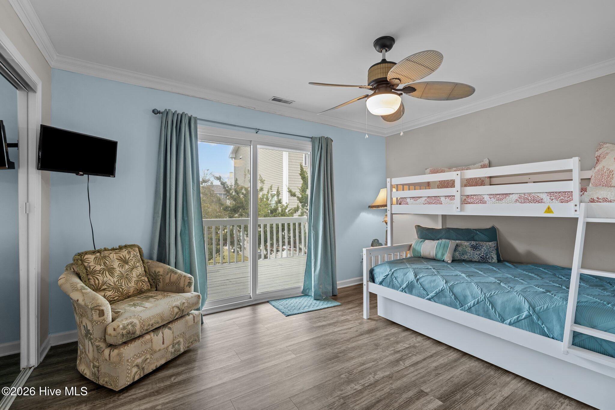 106 Azure Drive Emerald Isle, NC 28594 - Photo 9 of 71 Second bedroom set up with bunk beds - first level