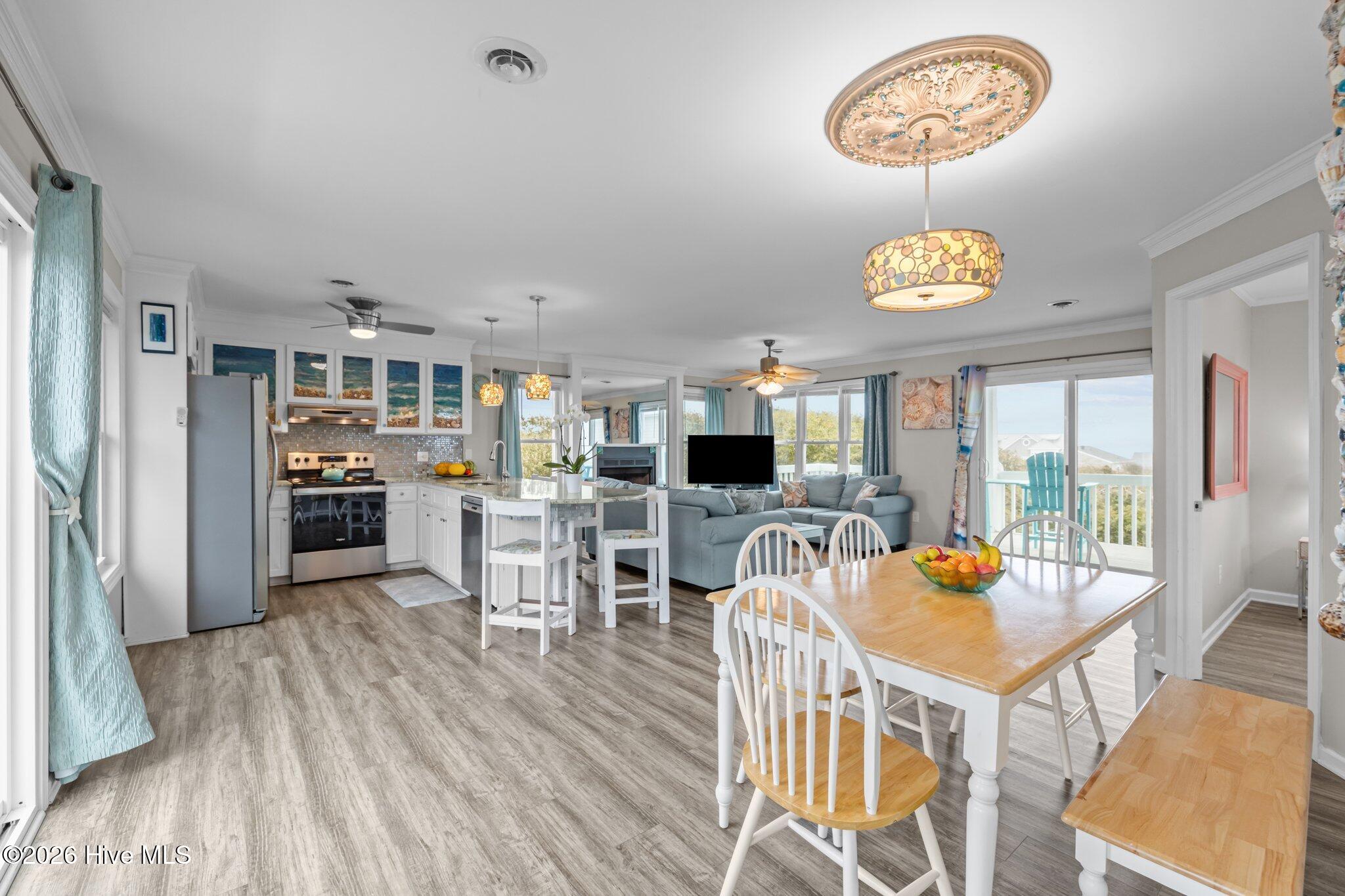 106 Azure Drive Emerald Isle, NC 28594 - Photo 20 of 71 Top level kitchen and dining combo