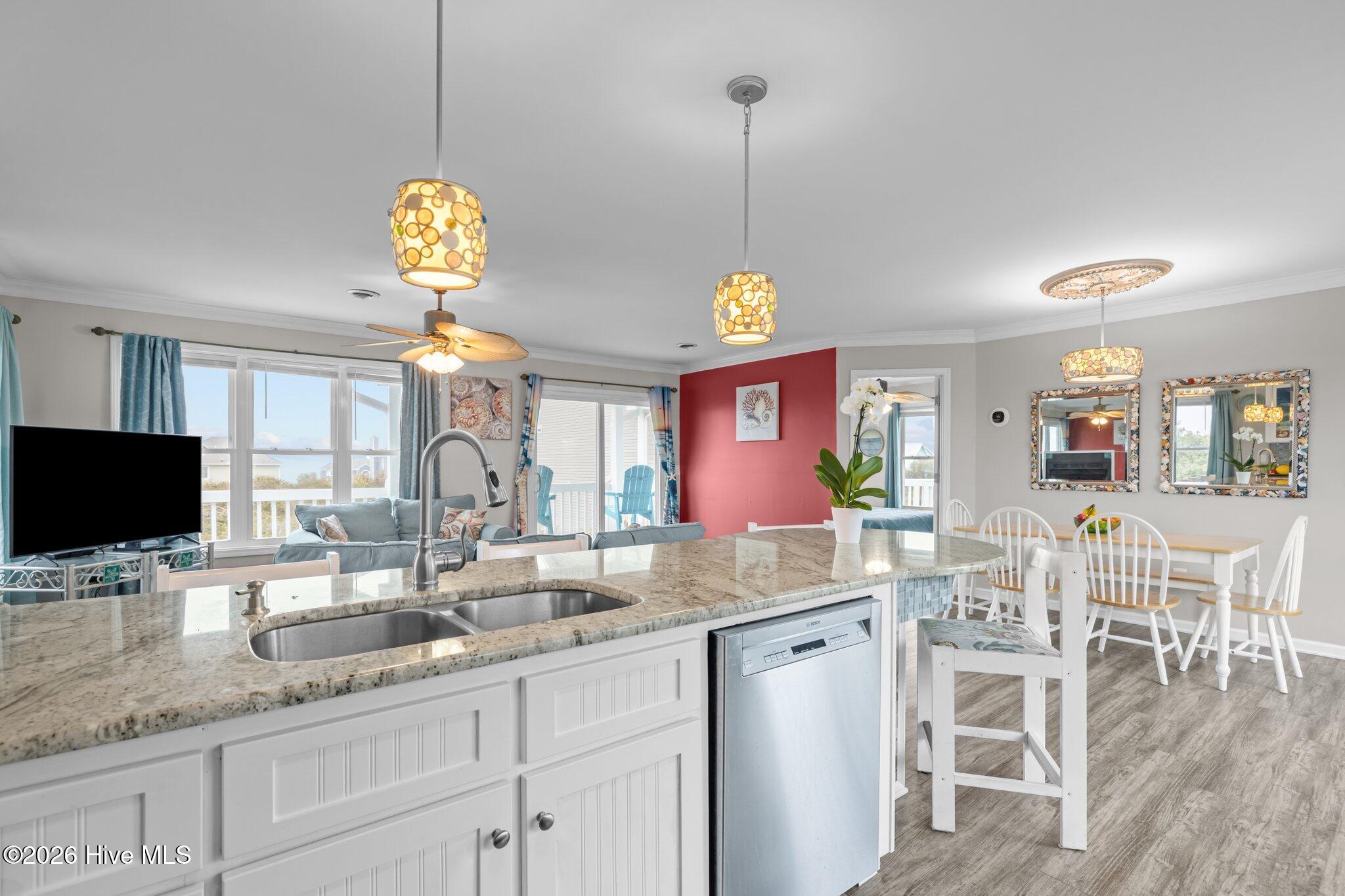 106 Azure Drive Emerald Isle, NC 28594 - Photo 21 of 71 View from kitchen into living area
