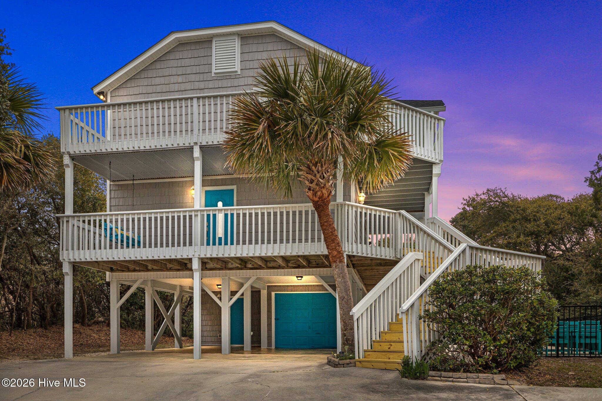 106 Azure Drive Emerald Isle, NC 28594 - Photo 2 of 71 Front of Home at sunset