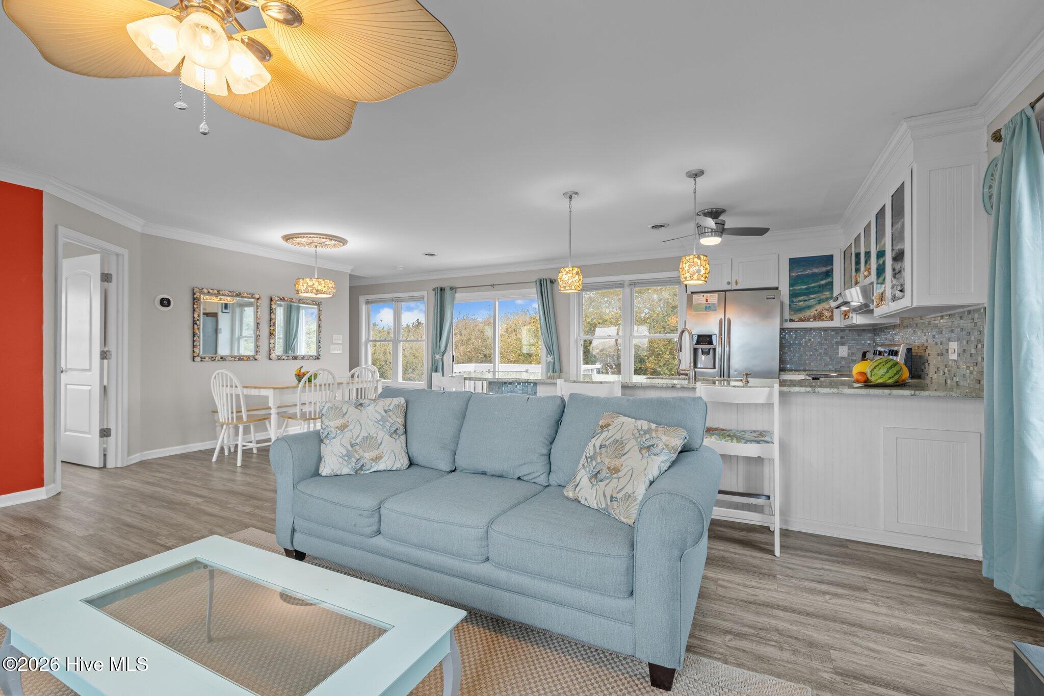 106 Azure Drive Emerald Isle, NC 28594 - Photo 29 of 71 View from living area into kitchen.