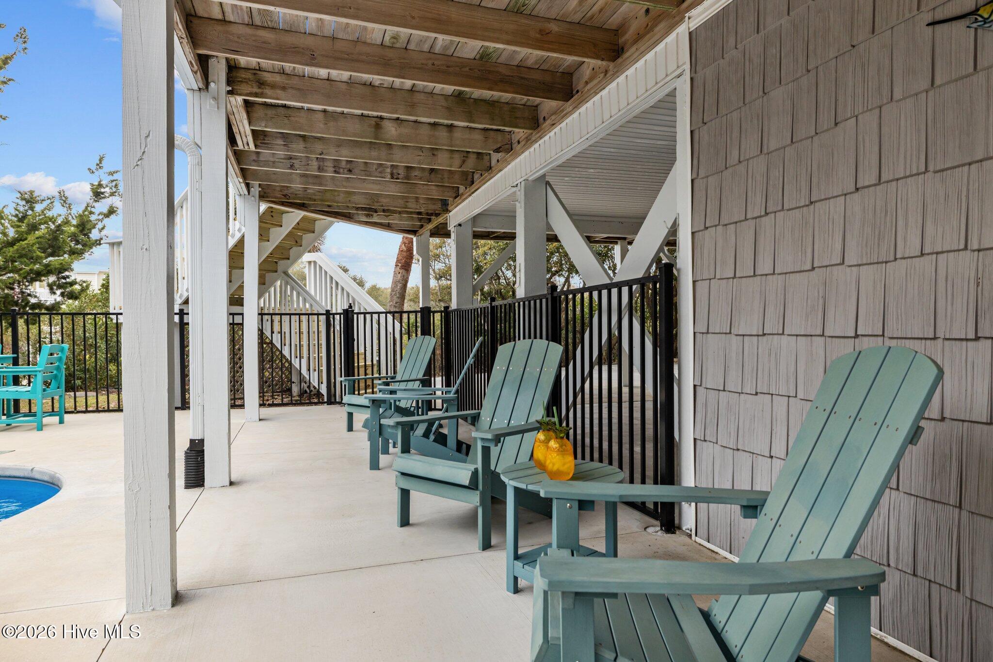 106 Azure Drive Emerald Isle, NC 28594 - Photo 35 of 71 Sitting area by pool