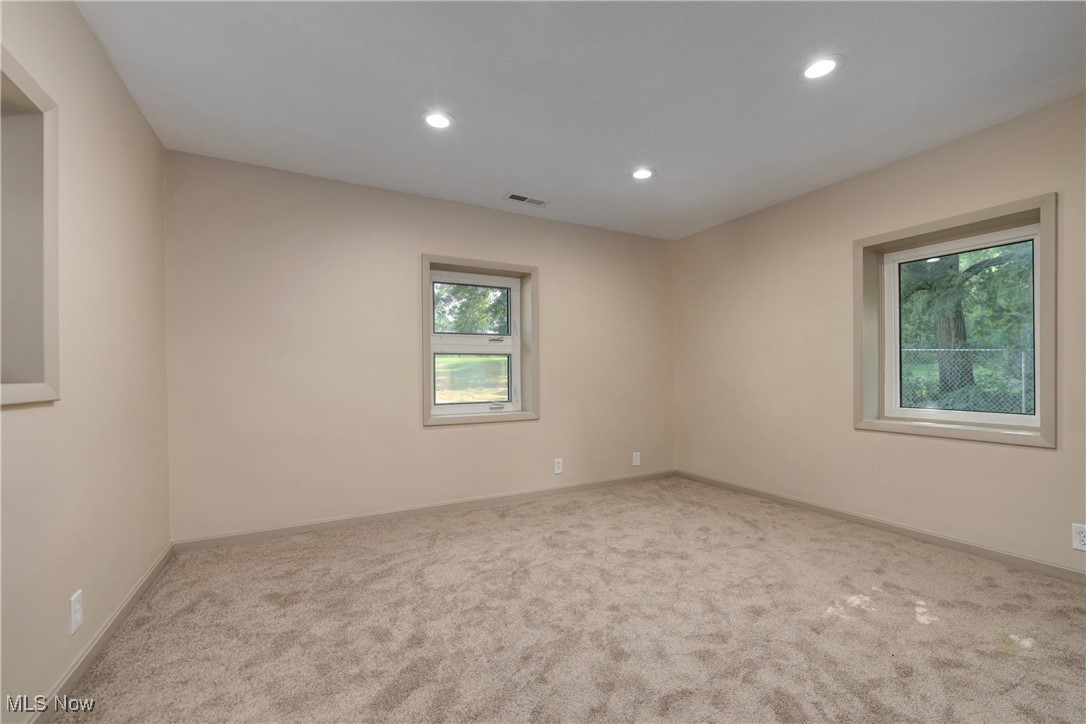 433 Chestnut Road Independence, OH 44131 - Photo 29 of 50 Unfurnished room with recessed lighting and carpet flooring