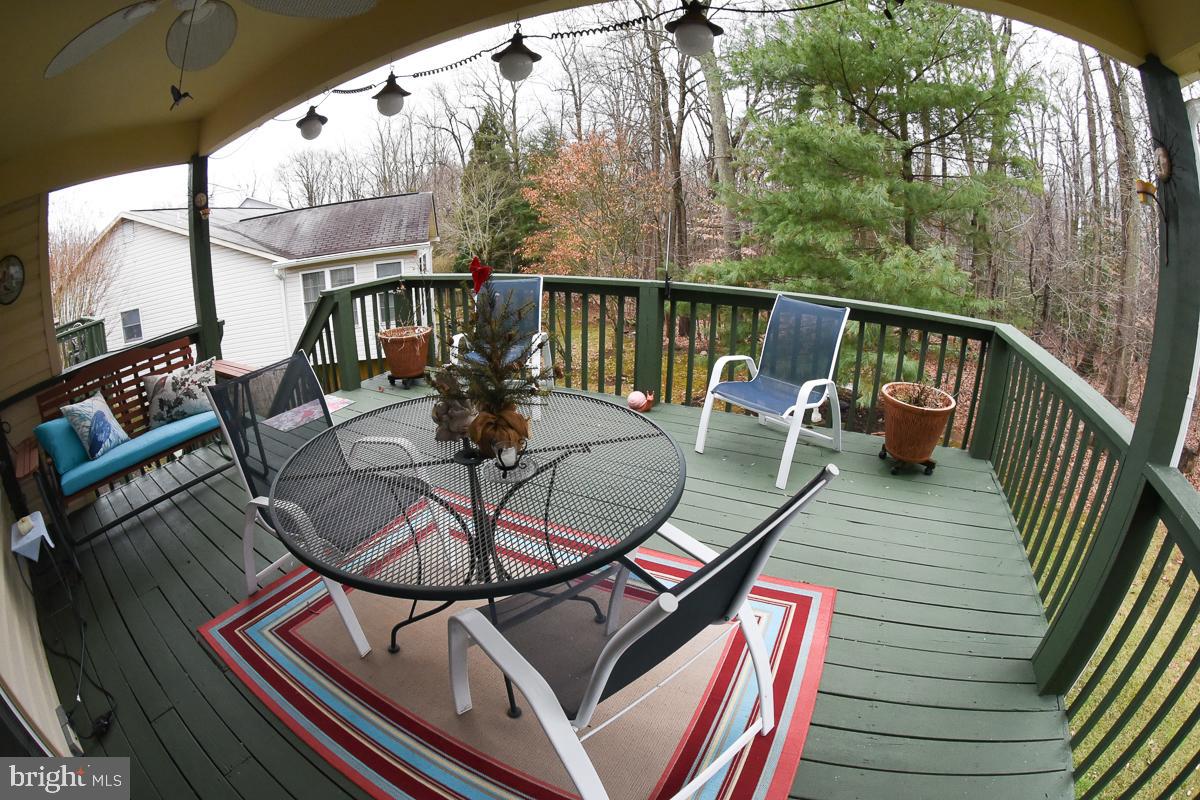 861 Rudder Way Annapolis, MD 21401 - Photo 3 of 37 Large covered deck with stairs to lower level