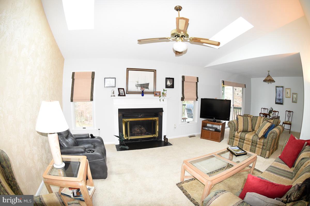 861 Rudder Way Annapolis, MD 21401 - Photo 5 of 37 Open living room with sky lights
