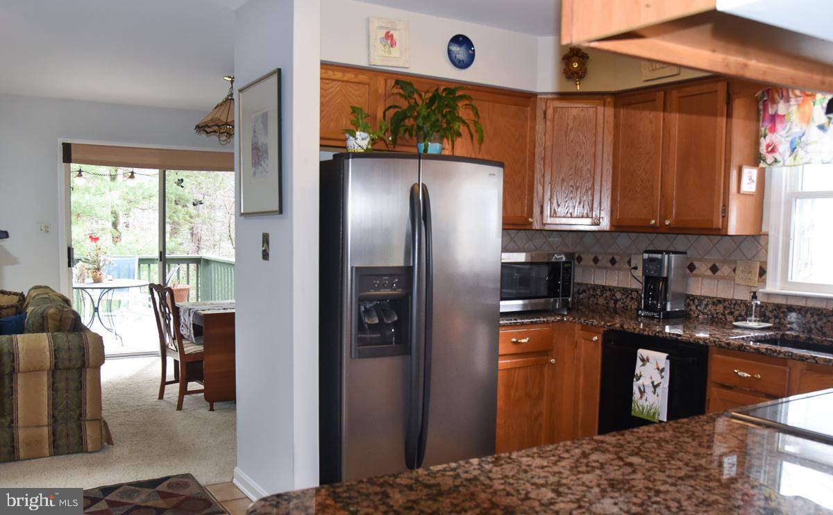 861 Rudder Way Annapolis, MD 21401 - Photo 8 of 37 Country kitchen going out to dining area