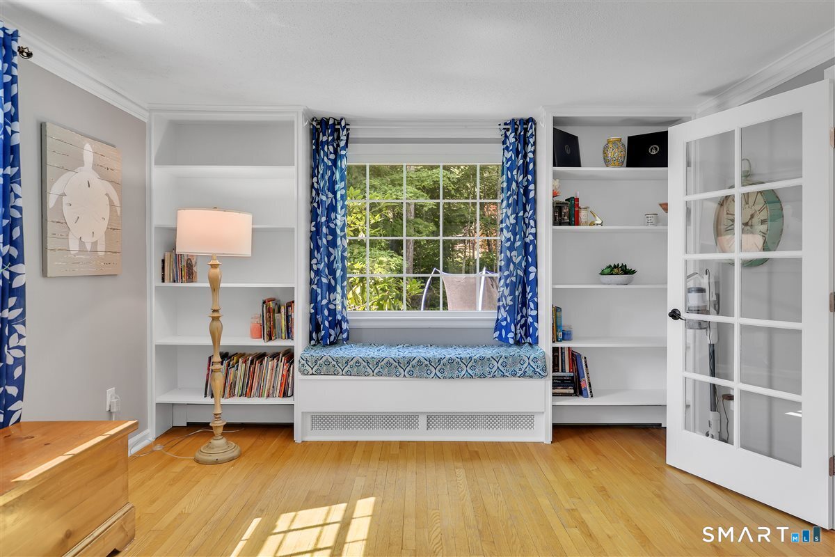 25 Silversmith Road Farmington, CT 06085 - Photo 8 of 33 a view of an empty room with a window and shelf