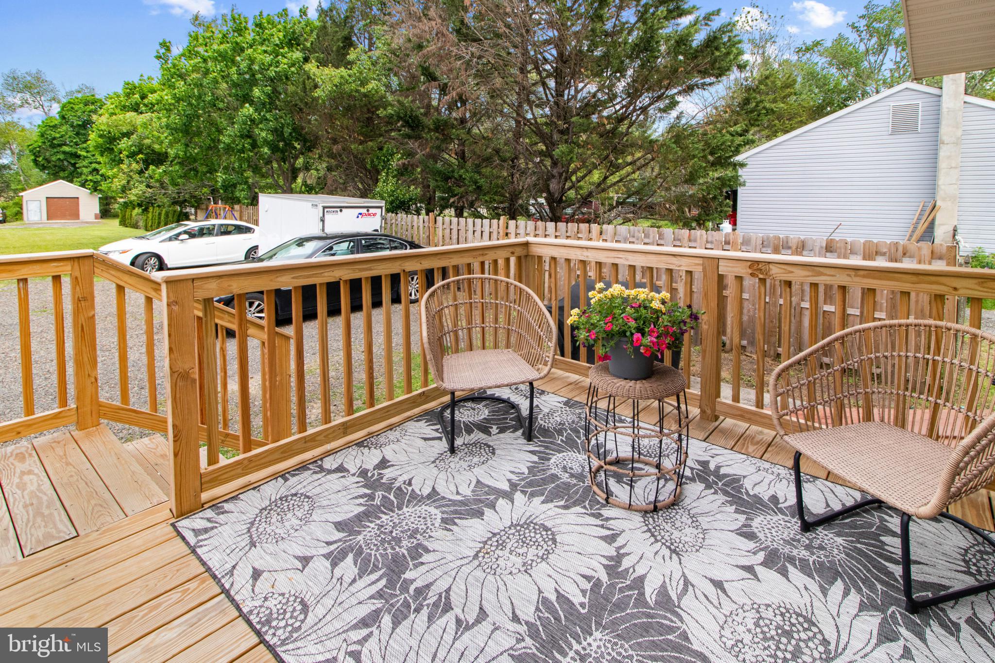 529 Ridge Road Southampton, NJ 08088 - Photo 21 of 25 Charming deck with vibrant greenery.