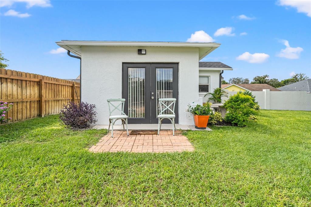 11487 Linden Drive Spring Hill, FL 34608 - Photo 26 of 42 a front view of a house with a yard
