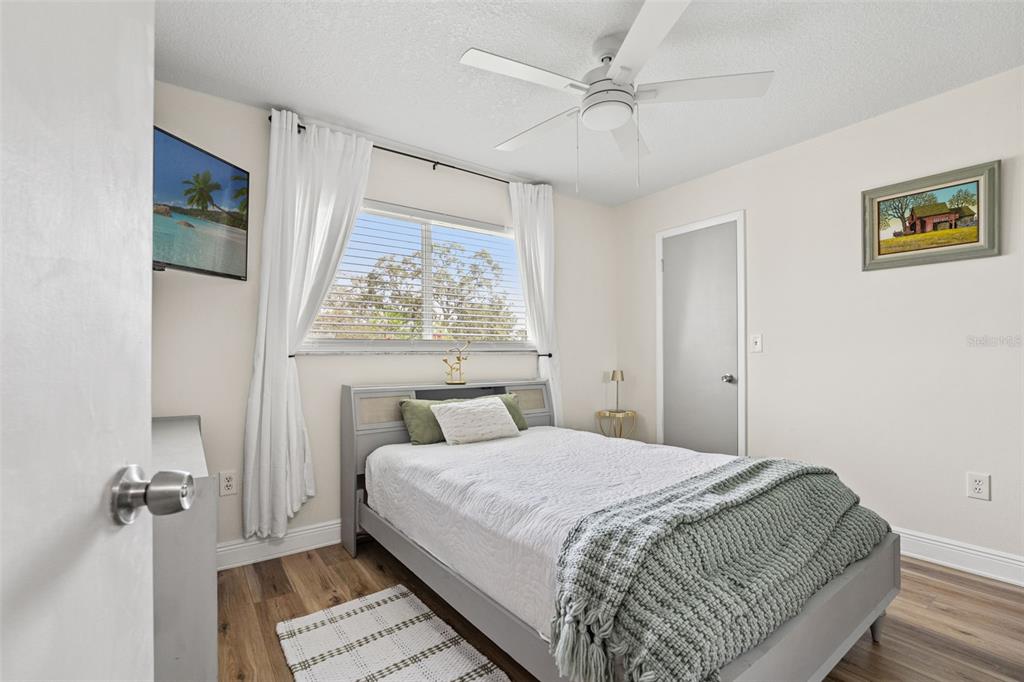 11487 Linden Drive Spring Hill, FL 34608 - Photo 3 of 42 a bedroom with a bed and a window