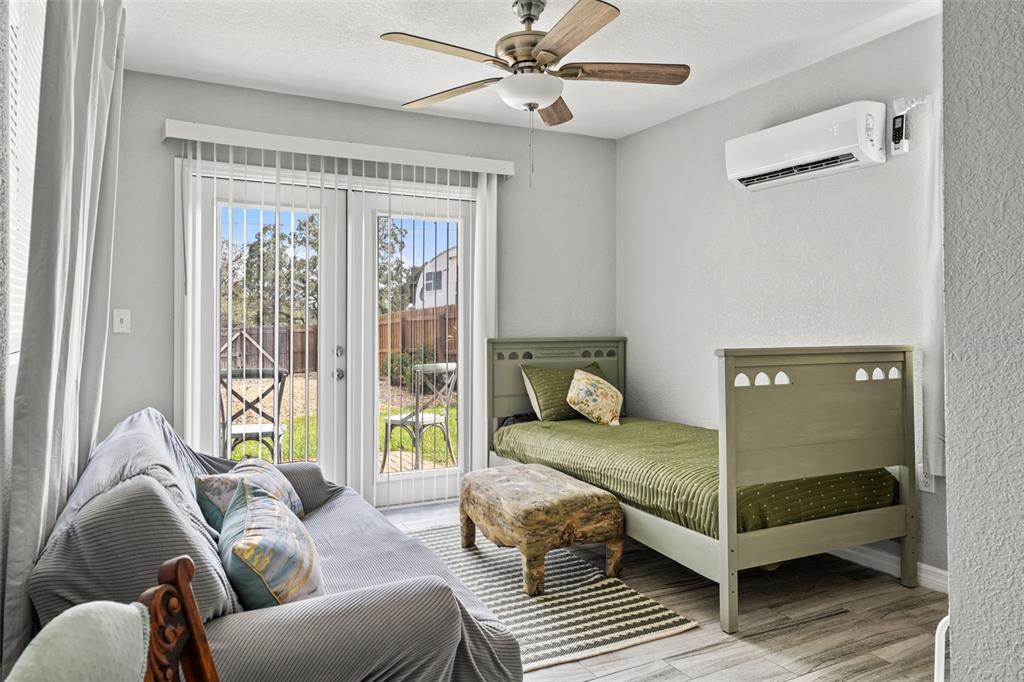 11487 Linden Drive Spring Hill, FL 34608 - Photo 31 of 42 a living room with furniture and a window