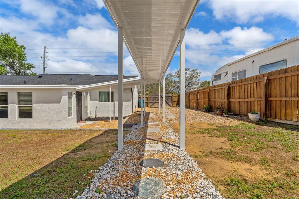 11487 Linden Drive Spring Hill, FL 34608 - Photo 40 of 42 a view of a house with backyard and sitting area