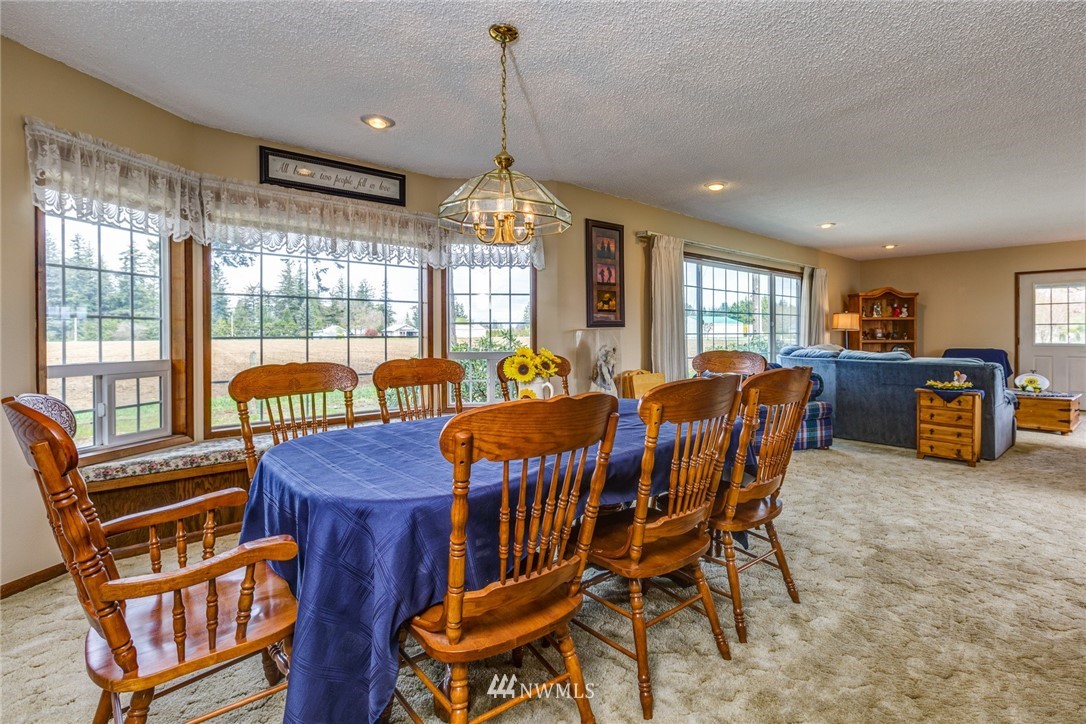 401 West Pole Road Lynden, WA 98264 - Photo 12 of 40 a view of a dining room with furniture window and outside view