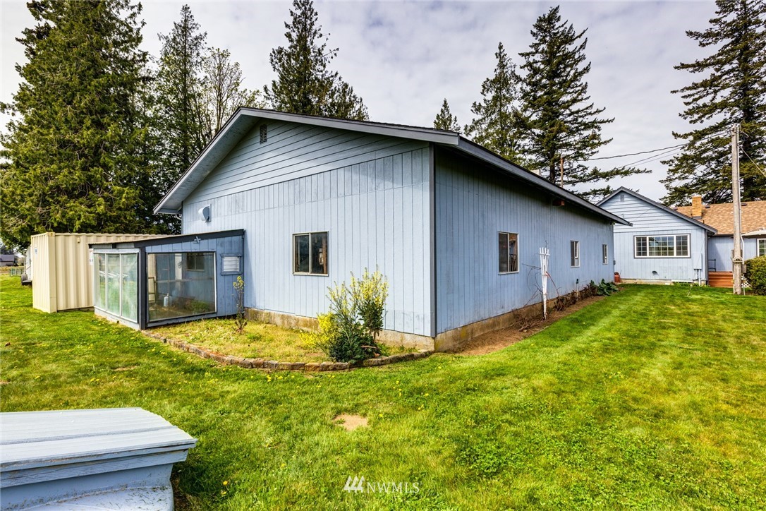 401 West Pole Road Lynden, WA 98264 - Photo 23 of 40 a view of a house with yard and garden