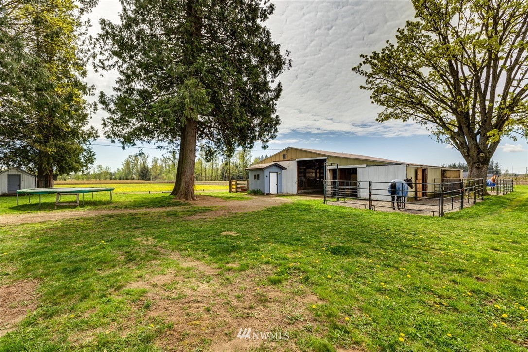 401 West Pole Road Lynden, WA 98264 - Photo 34 of 40 a front view of a house with a yard
