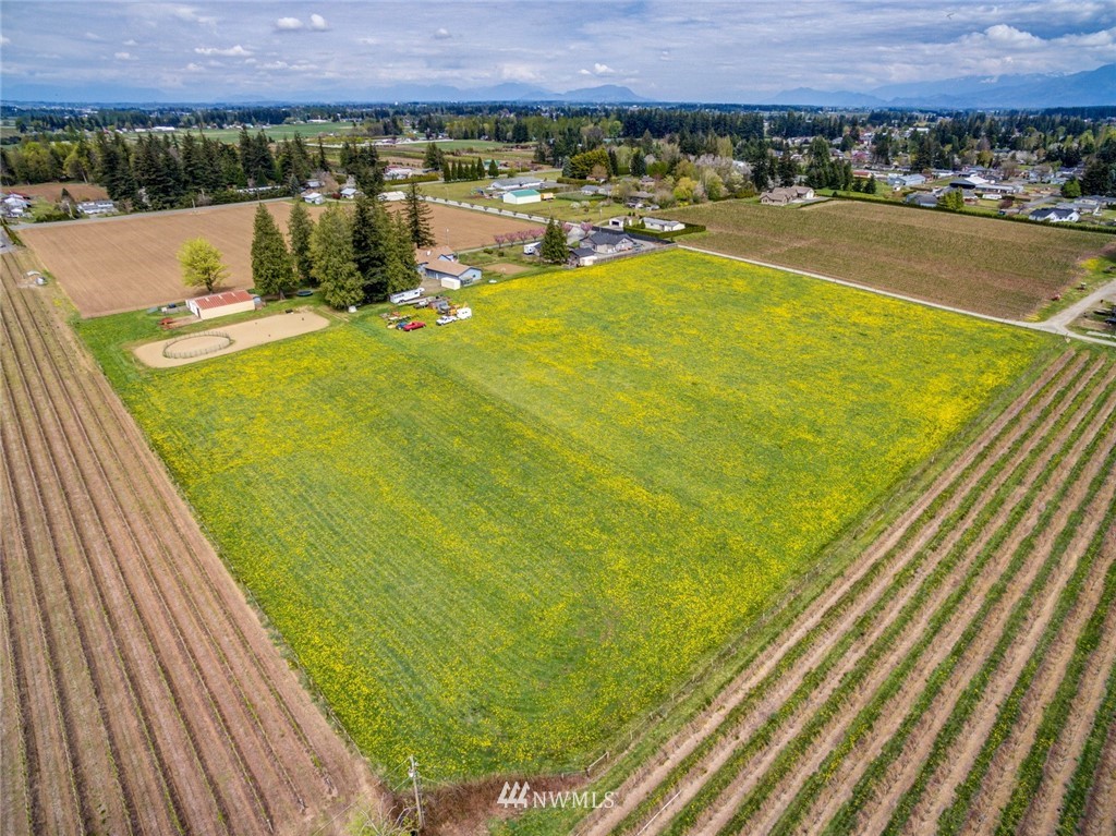 401 West Pole Road Lynden, WA 98264 - Photo 37 of 40 a view of a swimming pool and a yard
