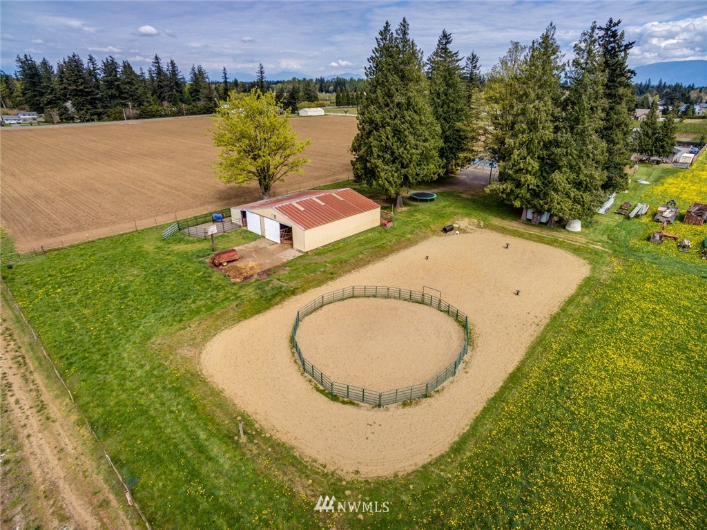 401 West Pole Road Lynden, WA 98264 - Photo 38 of 40 a view of a swimming pool with a yard and lake view