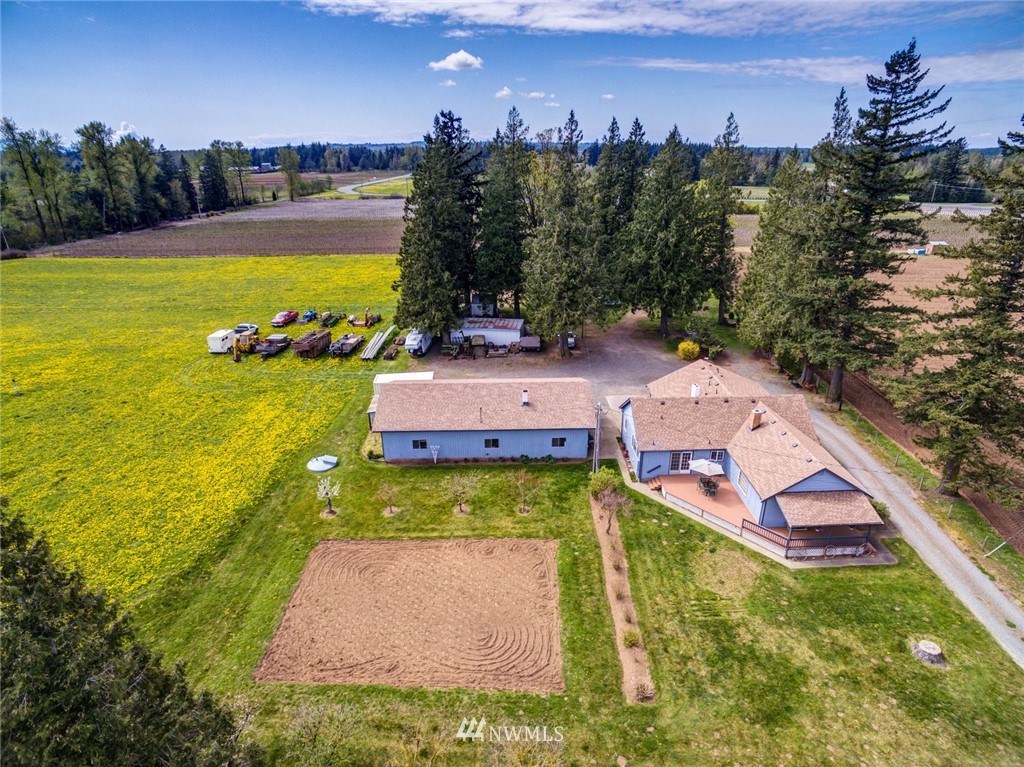 401 West Pole Road Lynden, WA 98264 - Photo 39 of 40 an aerial view of a house with garden space ocean view