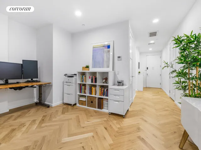 a view of a swimming pool with a lounge chairs