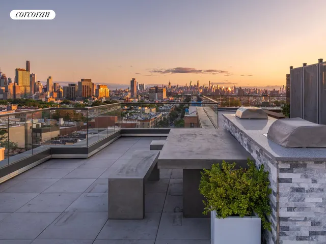 an aerial view of a balcony with city view