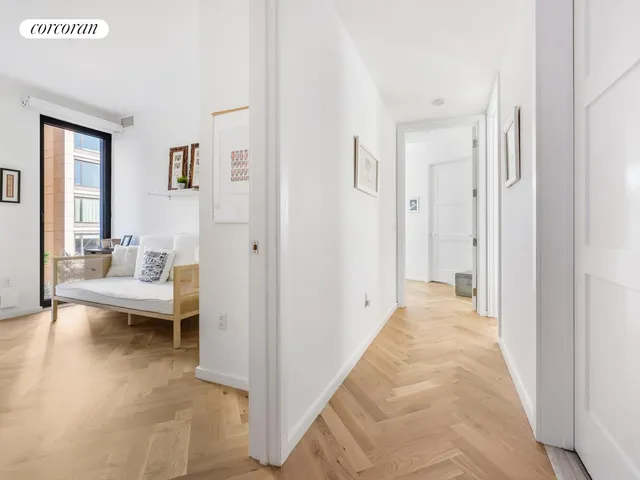 a view of a living room filled with furniture