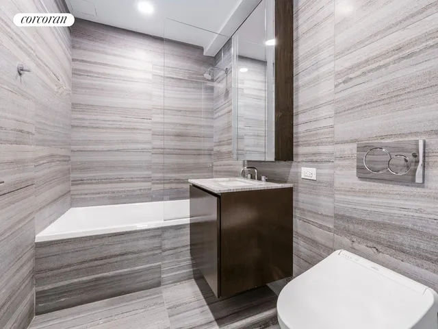 a bathroom with a sink and a toilet