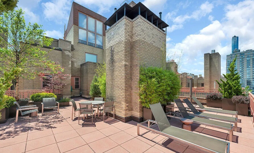 235 East 22nd Street, Unit 2T Manhattan, NY 10010 - Photo 10 of 12 a view of a patio with couple of chairs and potted plants