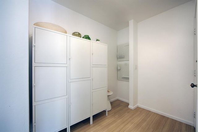 a white refrigerator freezer sitting in a kitchen