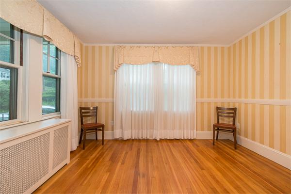 21 Follen Road Lexington, MA 02421 - Photo 11 of 19 wooden floor in an empty room with a window