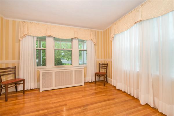 21 Follen Road Lexington, MA 02421 - Photo 12 of 19 a view of an empty room with a window and wooden floor