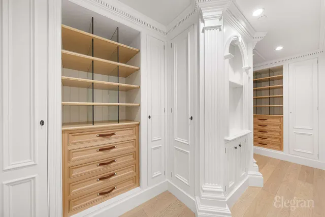 a bathroom with a granite countertop bathtub shower sink and mirror