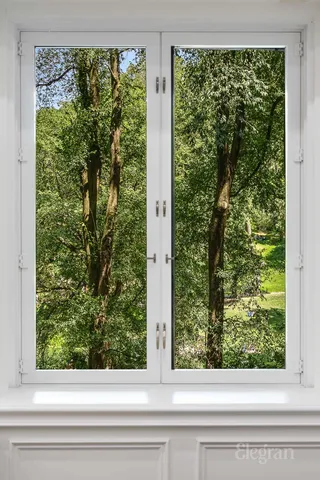 a view of a hallway with fireplace
