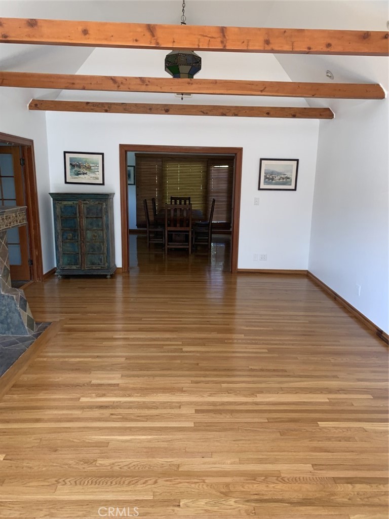1718 Cleveland Road Glendale, CA 91202 - Photo 11 of 44 a view of a livingroom with furniture wooden floor and a fireplace