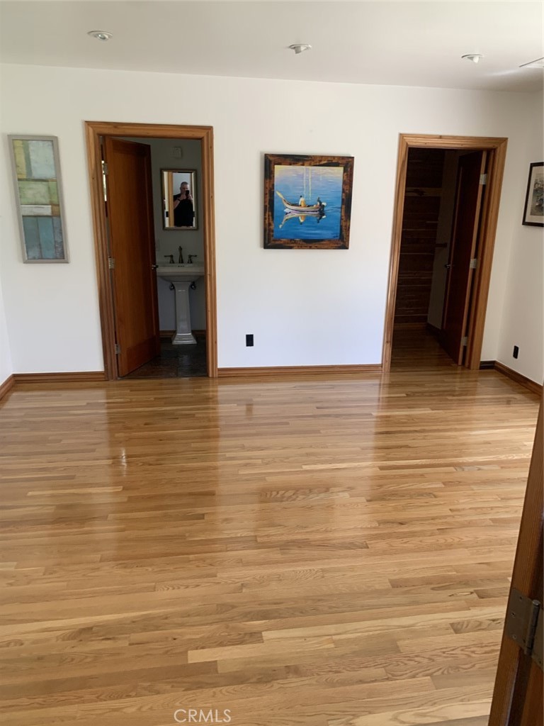 1718 Cleveland Road Glendale, CA 91202 - Photo 22 of 44 a view of a room with wooden floor