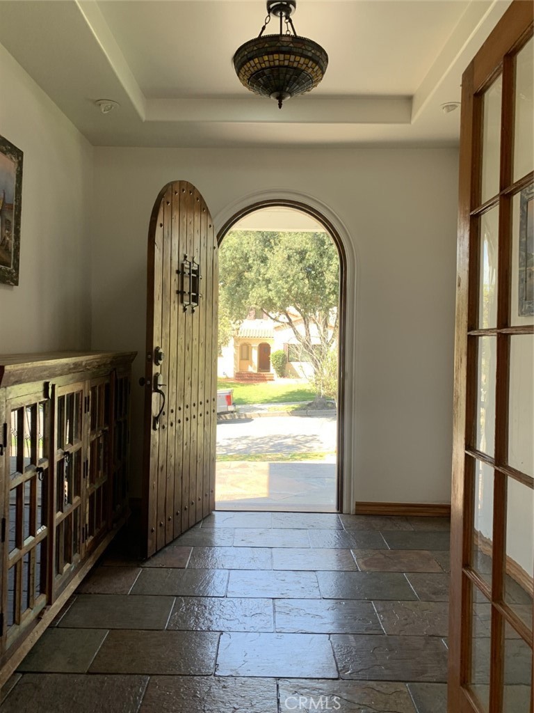 1718 Cleveland Road Glendale, CA 91202 - Photo 8 of 44 a view of empty room with a fireplace and a large window
