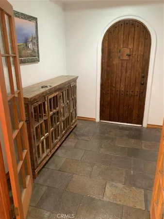 a view of an entryway with a front door