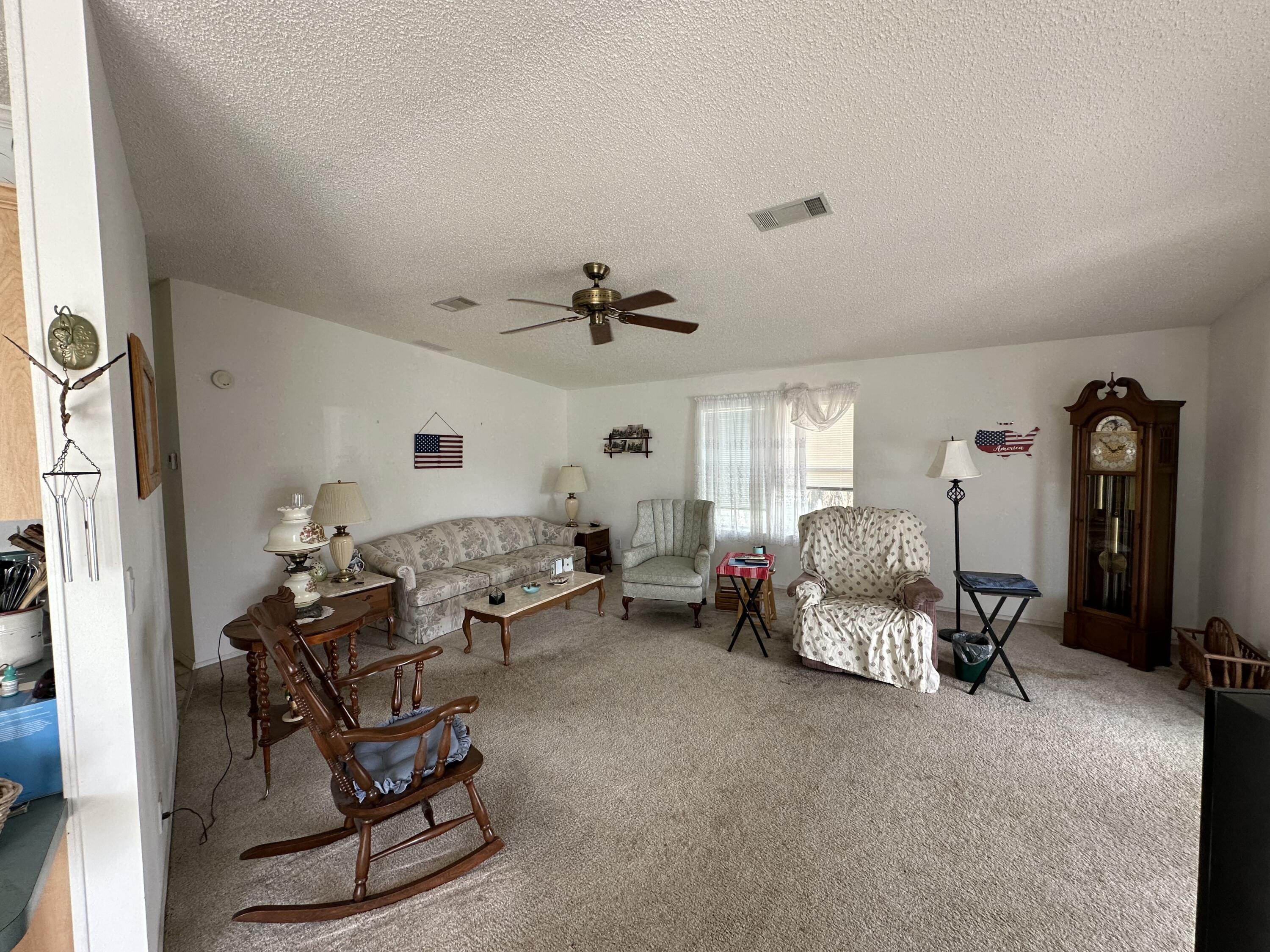 302 Tropical Isles Circle Fort Pierce, FL 34982 - Photo 16 of 22 a living room with furniture