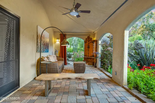 a view of living room filled with furniture