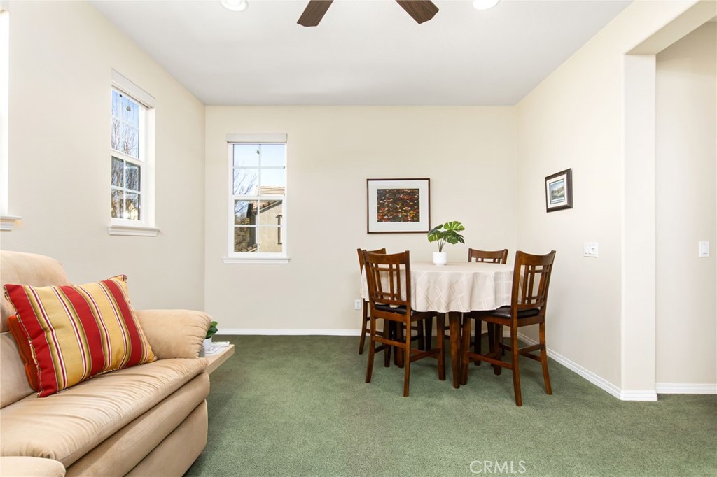 34641 Irwin Street Beaumont, CA 92223 - Photo 30 of 63 a view of a livingroom with furniture and a dining table