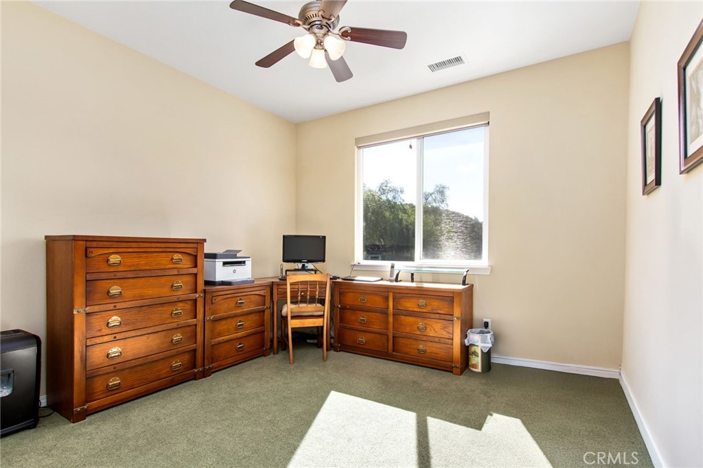 34641 Irwin Street Beaumont, CA 92223 - Photo 32 of 63 a room with furniture and window