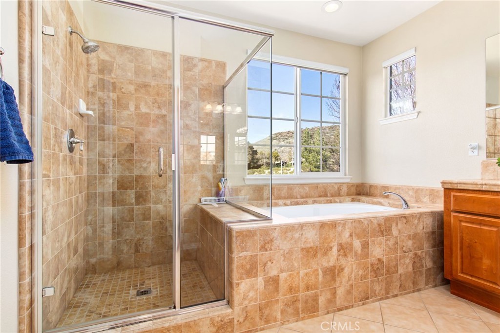 34641 Irwin Street Beaumont, CA 92223 - Photo 36 of 63 a bath tub sitting next to a window