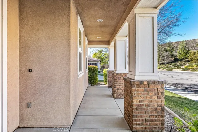 a view of entrance with wooden floor and fence