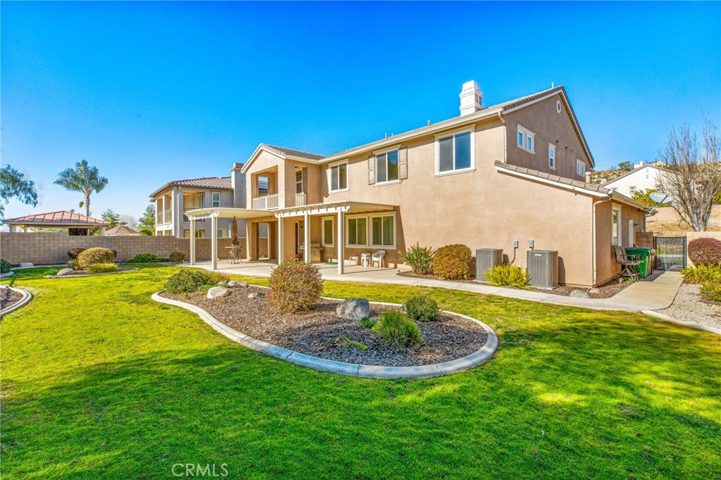 34641 Irwin Street Beaumont, CA 92223 - Photo 41 of 63 a view of a house with a swimming pool