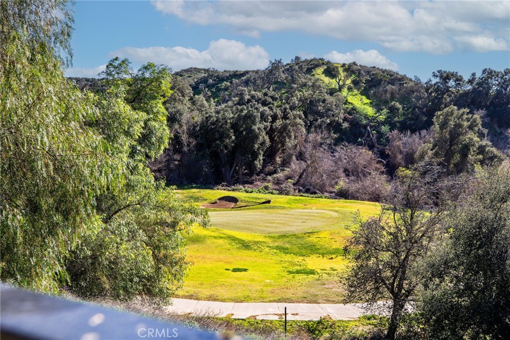 34641 Irwin Street Beaumont, CA 92223 - Photo 49 of 63 a view of a swimming pool with an outdoor space and seating area